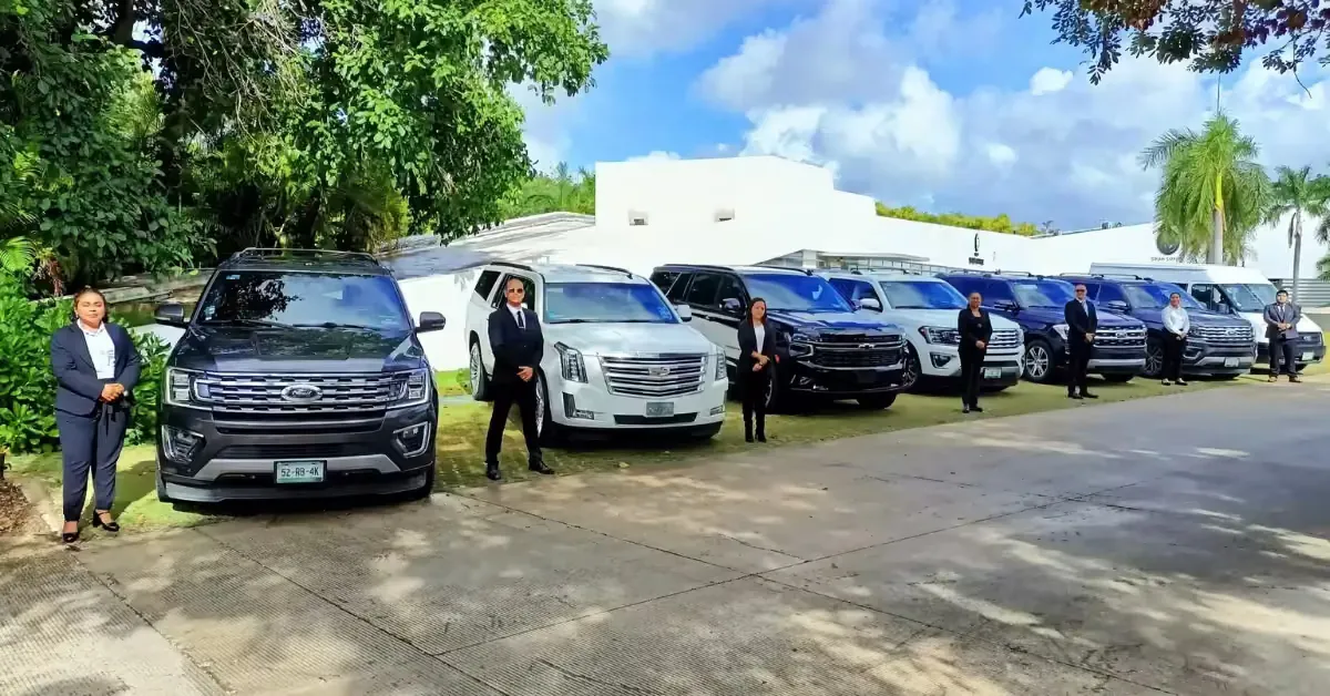 Private driver waiting beside a comfortable van in Cancun